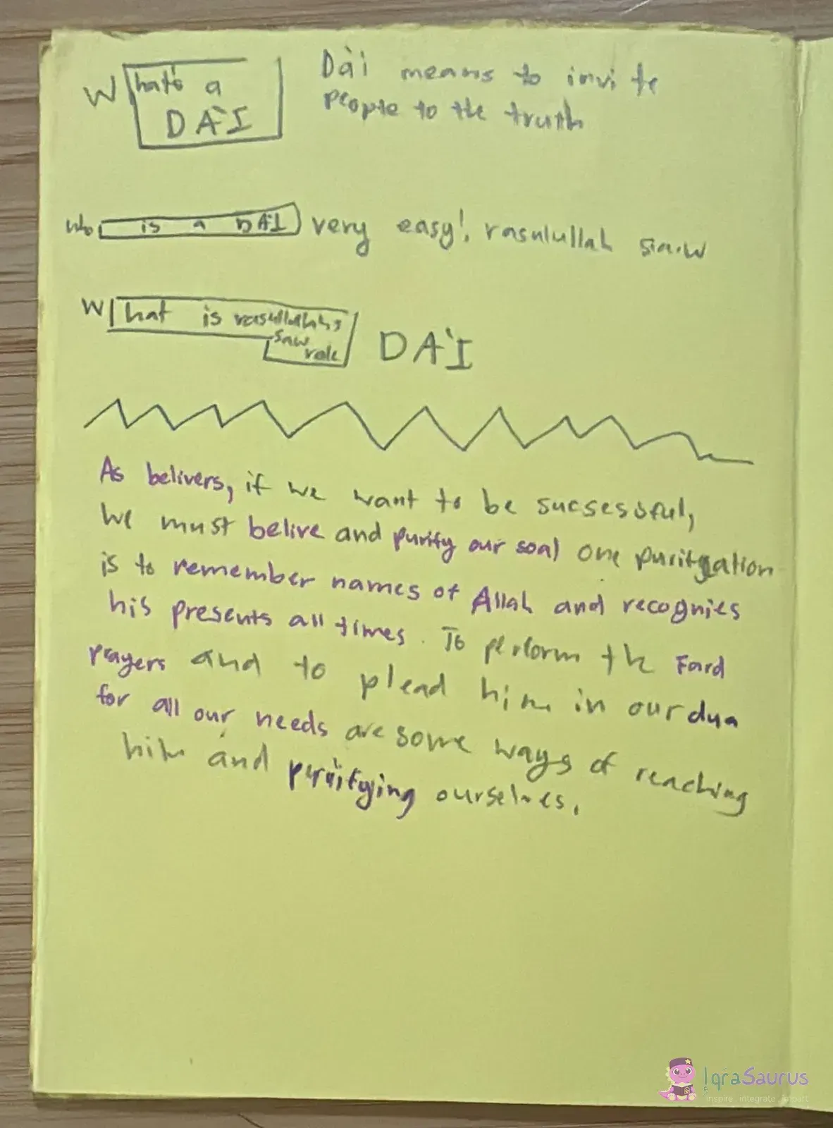 A page of questions in boxes about what a Da'i is, then a paragraph in purple ink below a zigzag line.